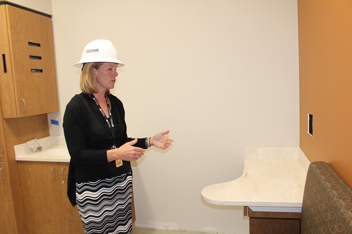 Cheryl Schweizer/Columbia Basin Herald
Dulcye Field, chief operations officer for Columbia Basin Health Association, shows off a partially-completed medical exam room at the new CBHA clinic now under construction in Othello.