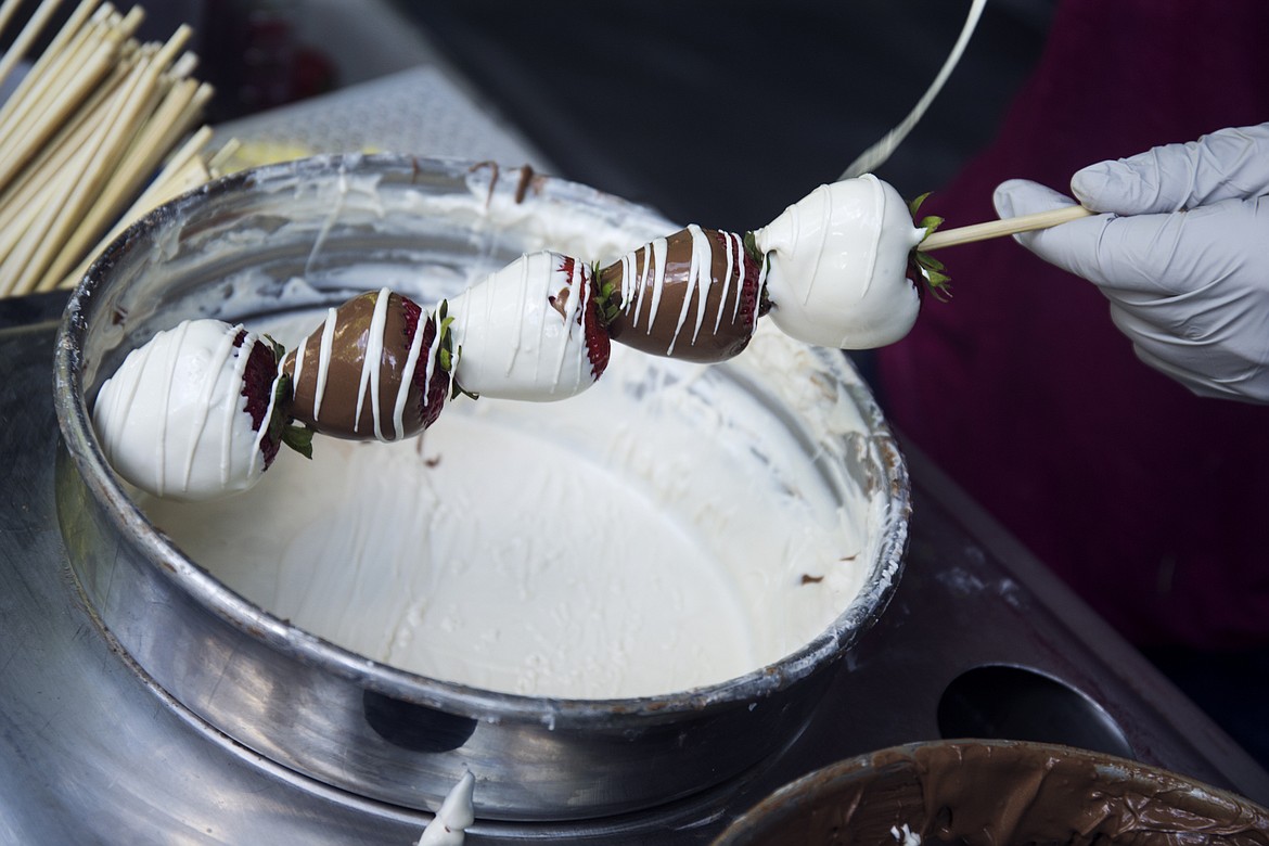 LOREN BENOIT/PressA strawberry kabob from Berry-Ka-Bob at Taste of Coeur d'Alene 2016.