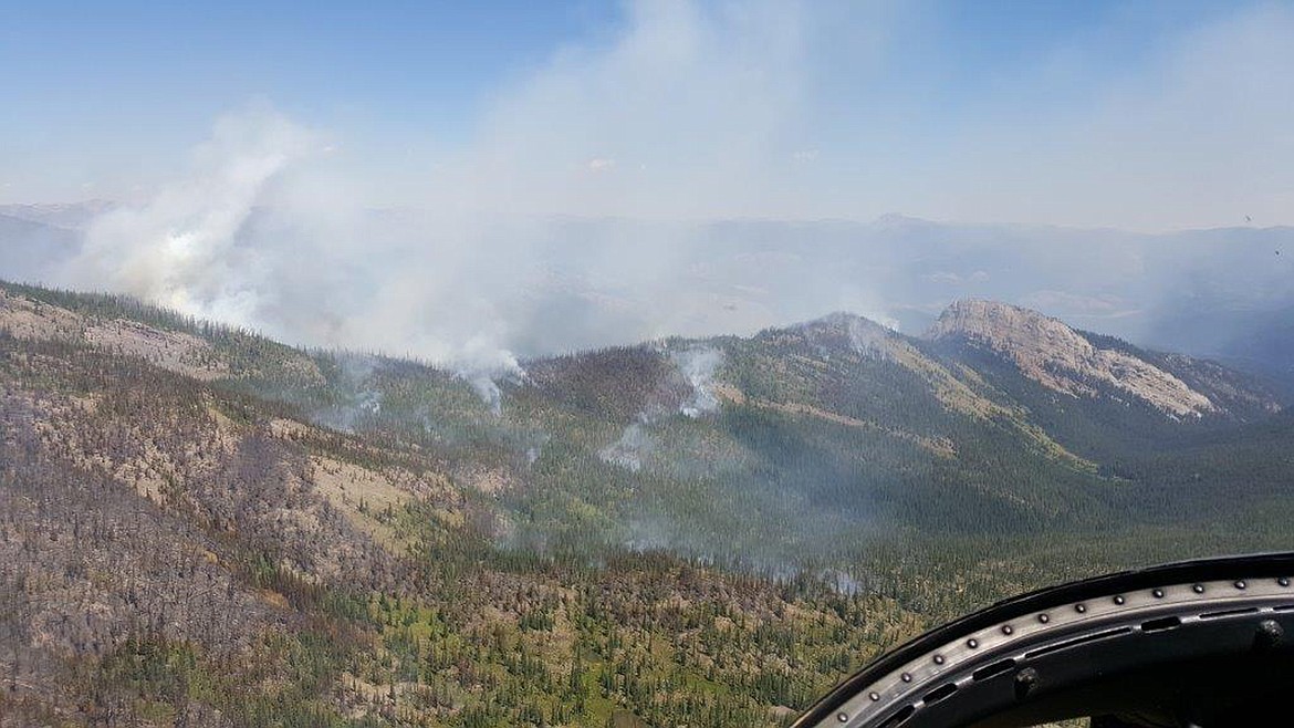 Included in Montana&#146;s 21 listed large fires is the Monahan Fire, located between Monahan Mountain and the border of the Bob Marshall Wilderness Complex at Limestone Pass. As of Monday afternoon, the fire had grown to 494 acres. Of that, 278 of the burned acres are on the Lolo National Forest and 216 are on the Flathead National Forest. (Photo courtesy of https://inciweb.nwcg.gov)