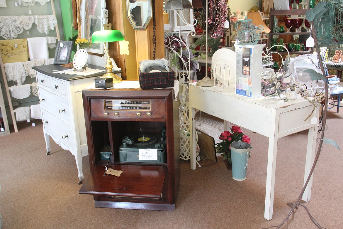 Deborah Davis&#146;s booth features her restored and hand painted furniture and an old radio.