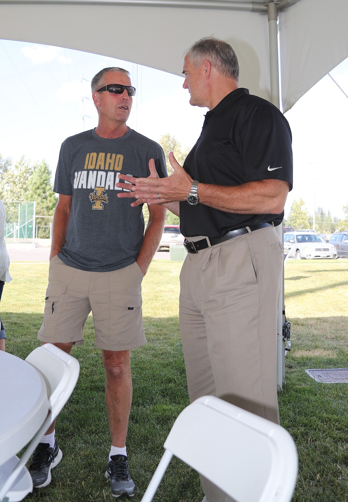 (Photo by ERIC PLUMMER)
University of Idaho athletic director Rob Spear chats with Sandpoint&#146;s Jim Nieman on Thursday night at a Vandal Gatherin at Dover Bay. Jim&#146;s daughter Alli Nieman is in the Idaho Athletic Hall of Fame for her basketball and volleyball exploits, and now teaches at Timberlake High School.