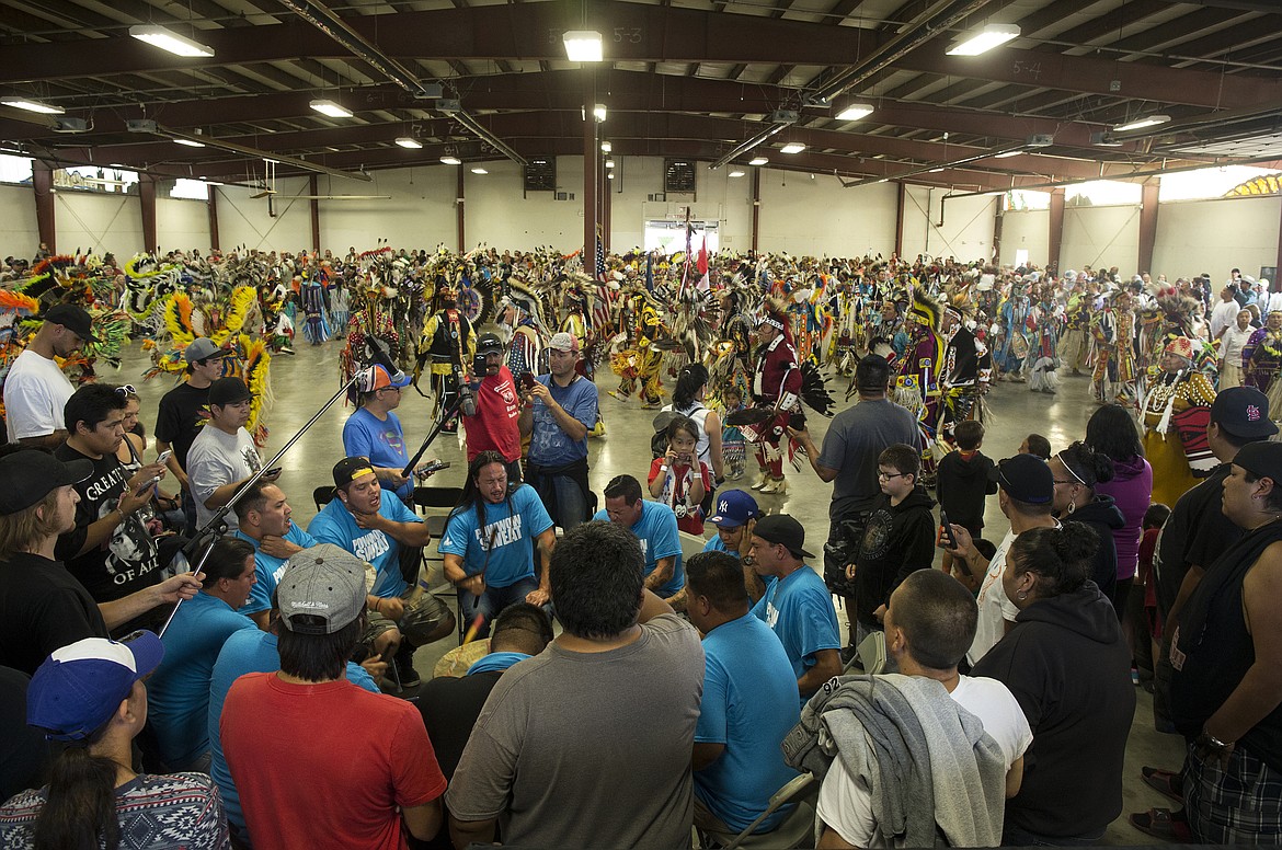 LOREN BENOIT/Press File
Hundreds of dancers participate in the 2016 Julyamsh Powwow Grand Entry to the host drum of Bear Creek at the Kootenai County Fairgrounds. Between 600-800 dancers and 25-30 drum groups, as well as representatives from Coeur d&#146;Alene Casino and Julyamsh, are expected this year. A horse parade will take place at 12:30 p.m. today and Saturday and with grand entry at 1 p.m. and 7 p.m. each day.