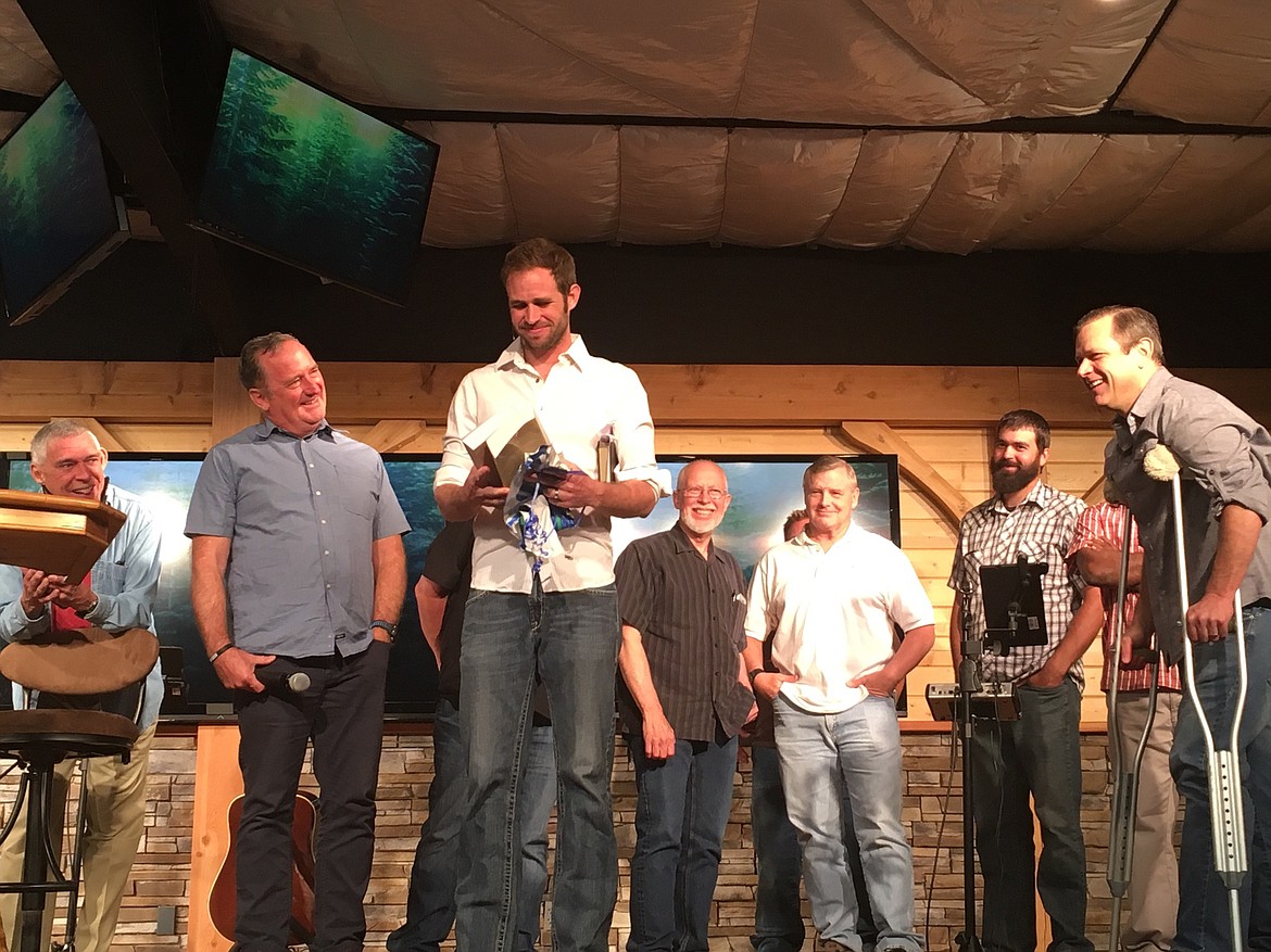 Courtesy photo
Teaching and Vision Pastor Garrett Graupner handed over the reins to the new Teaching and Vision Pastor, Justin Gibbins, in a ceremony on Sunday, June 11.