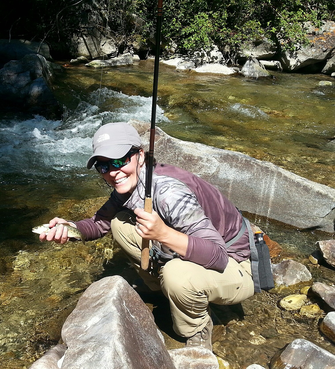 Lindsey out enjoying one of her many hobbies, fly fishing and enjoying the outdoors.