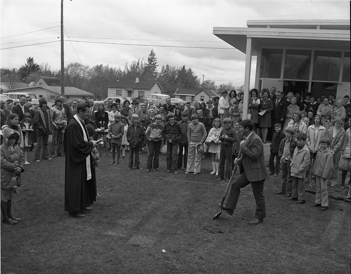 The groundbreaking ceremony of the new Methodist Church on May 12, 1974. Pastor Ray Davis led the service and John Marceau, the building committee chairman, broke dirt.