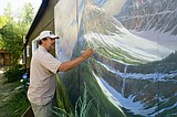 Hungry Horse artist working on mural for bank