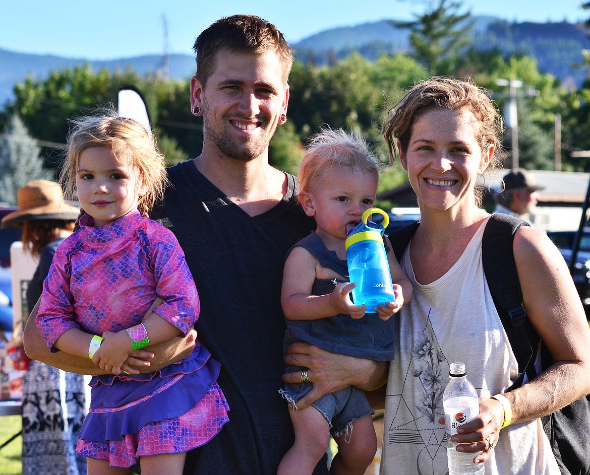 The Banavich Family of Pheonix Ariz., enjoying the afternoon in the park at the CASA Event. Left to right are Emery (4), Nick, Grayson (1) and Katie. (Erin Jusseaume/Clark Fork Valley Press)