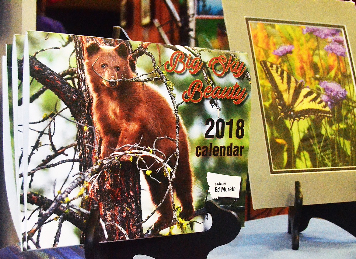Sanders County local Ed Moreth showcased his new 2018 calander at his booth, with the front cover shot one he took in his own back yard.