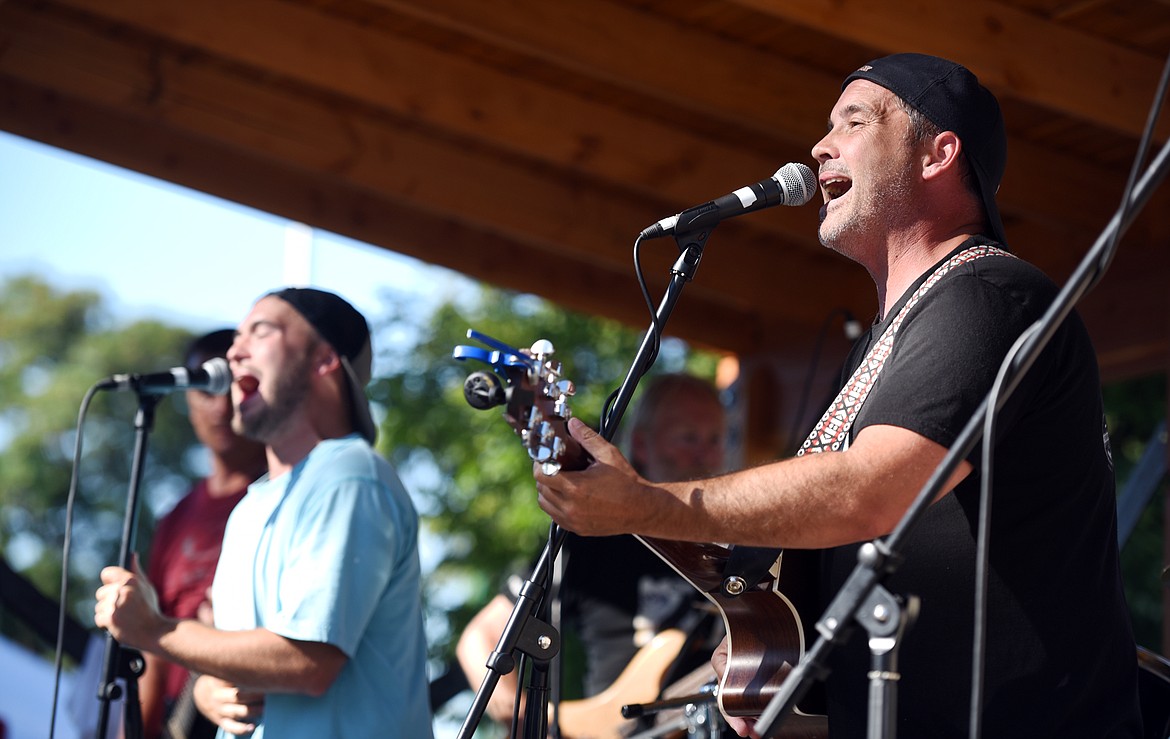Tommy Edwards Jr., left, and Tommy Edwards Sr. perform with Comatose Posse at Thursday!Fest on Thursday, July 13, in Kalispell.