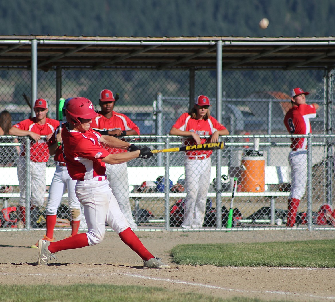 (Photo by ERIC PLUMMER)
Preston Pettit gets under a fastball for the North Idaho American Legion baseball team in the home finale recently. The district tourney begins today in Coeur d&#146;Alene, with a berth at state on the line.