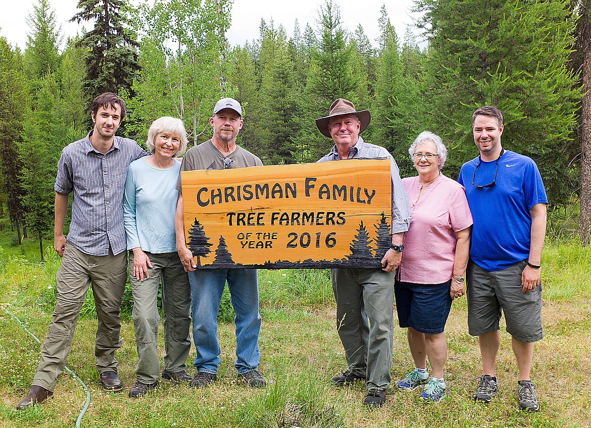 From left, Mark Chrisman, Kari Wiley, Tim Wiley, Allen Chrisman, Charlotte Chrisman and Baird Chrisman at the family homestead up the North Fork last week. They were recently named regional tree farmers of the year.