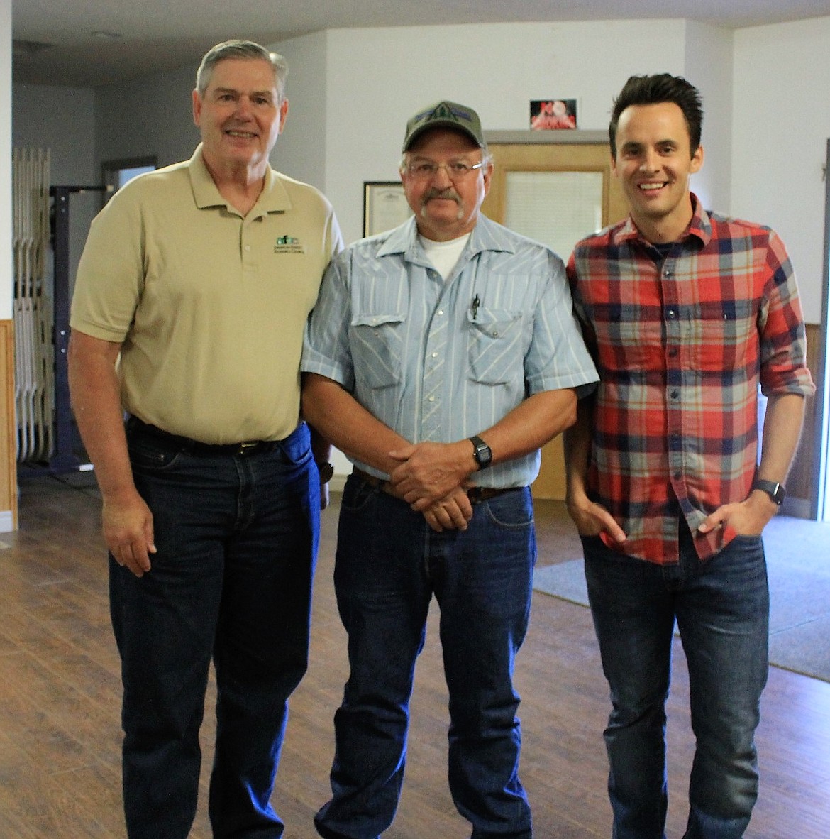 Tom Partin with TDP Consulting (left) and American Forest Resource Council President, Travis Joseph (right) join Tricon&#146;s Willy Peck for a meeting and tour of the Redd Bull Project located near St. Regis on July 18. (Kathleen Woodford/Mineral Independent)