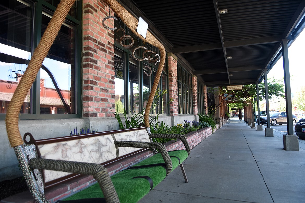 Steven Miller created the bench that sits outside Mackenzie River Pizza Co. (Heidi Desch/Whitefish Pilot)