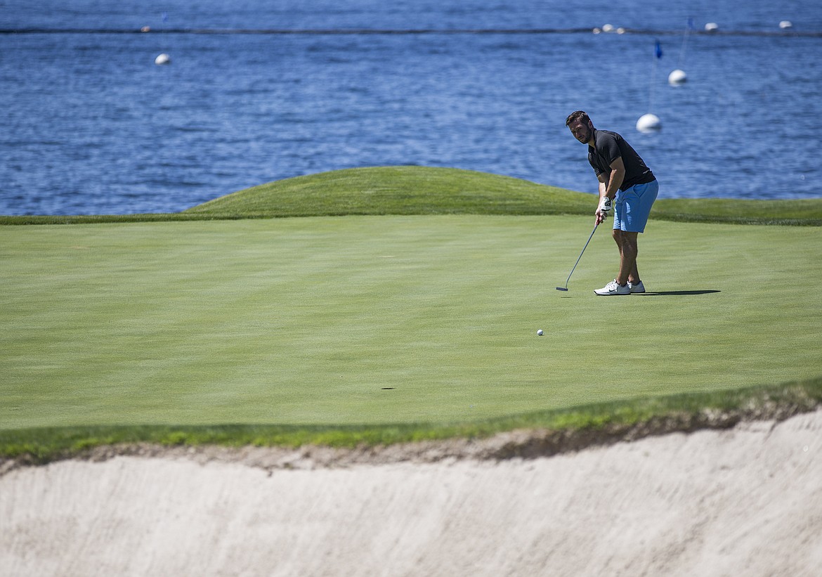 LOREN BENOIT/Press

NHL hockey player Tyler Johnson hits a long putt on hole 13 during The Showcase Saturday afternoon at The Coeur d&#146;Alene Resort Golf Course.