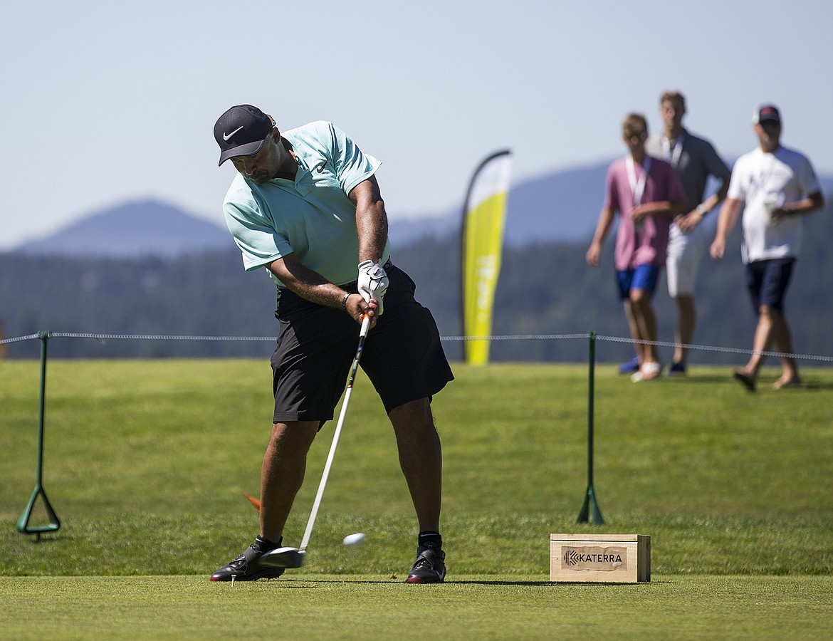 LOREN BENOIT/Press
Former NHL goaltender Grant Fuhr drives off the first tee during The Showcase on Saturday afternoon at The Coeur d&#146;Alene Resort Golf Course. In his hockey career Fuhr won a total of five Stanley Cups and was a seven-time All-Star.