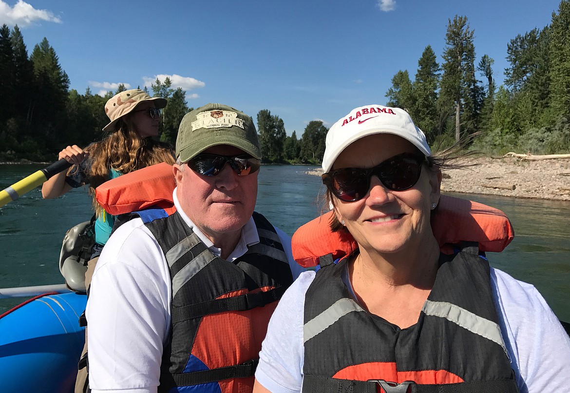 Barbara Sue and her husband Brad Brodie of South Carolina take a photo during a scenic rafting trip while on vacation in Glacier National Park. Barbara Sue Brodie recently survived a heart attack and cardiogenic shock due to the quick response of Glacier park rangers, ALERT and Kalispell Regional Medical Center staff. (Photos courtesy of Barbara Sue Brodie)