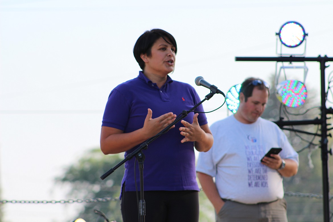Chanet Stevenson/The Sun Tribune - Meghan Endsley, PA-C for Columbia Basin Health Association, addresses the crowd, encouraging them to go in for cancer screenings and to ask their doctors questions about why they should be tested and the process it entails.