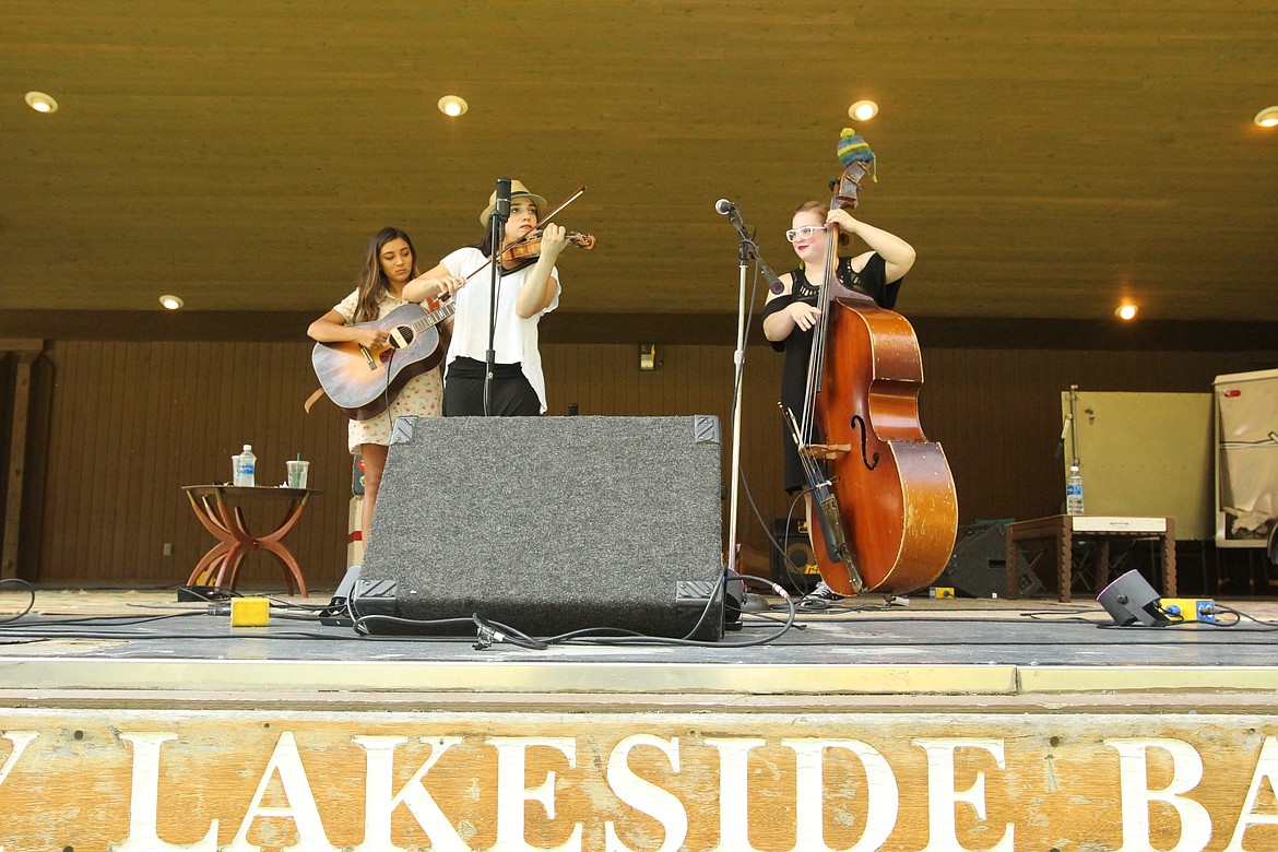 MITCHELL BONDS/Press
Members of &#147;The No Going Back Band&#148; from left, Dani Meeks, Amanda Poulos and Mikayla Ludiker perform at the Lakeside Bandshell for the listening enjoyment of patrons of Taste of Coeur d&#146;Alene on Sunday.