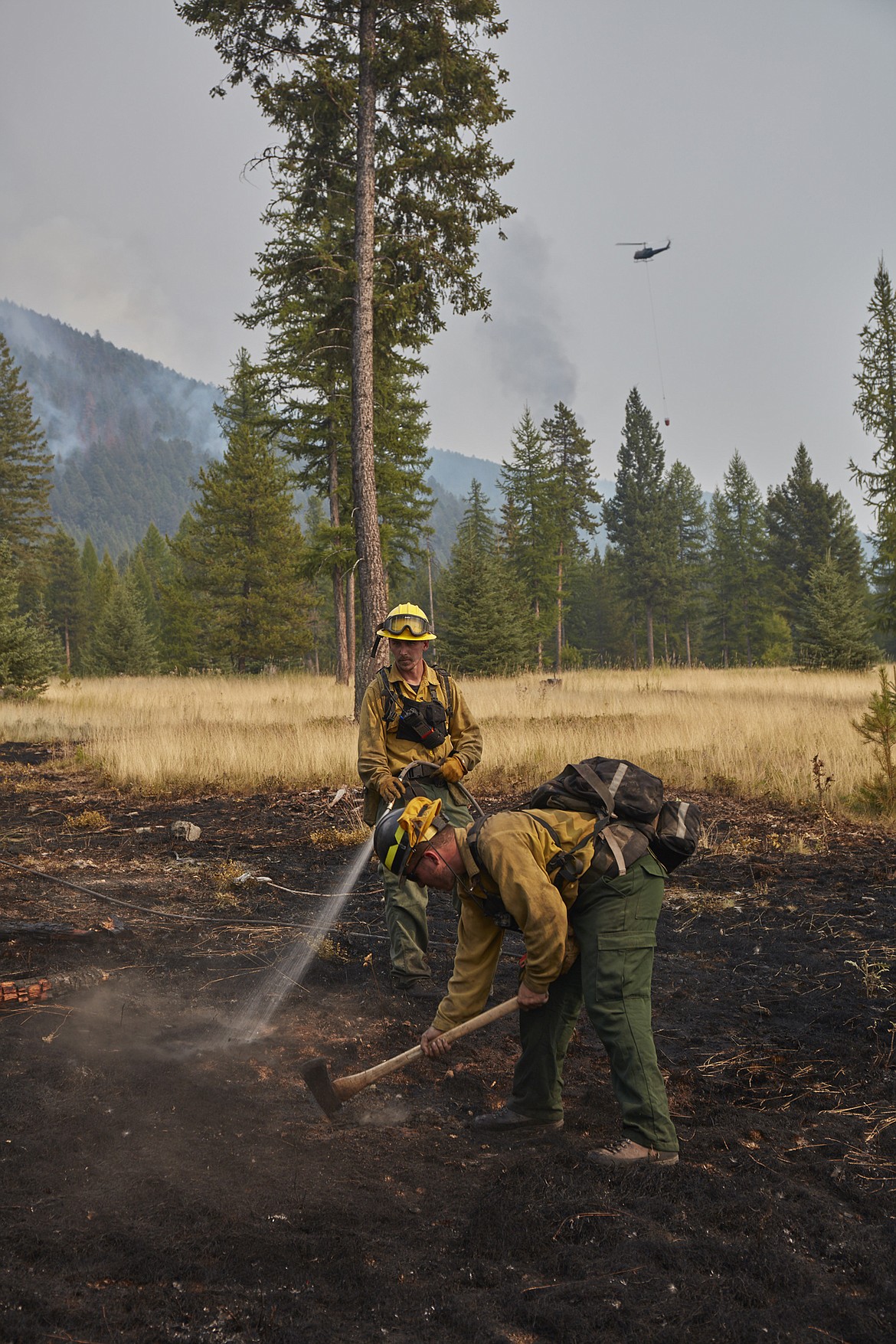 Firefighters work on the Gibralter Ridge Fire east of Eureka.