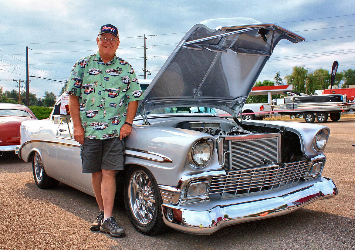 Tom Watkins stands to the side of his 1956 Chevy Bel Air-. Tom won for best interior at the 2017 Evergreen Car Show. (Patrick Booth/Mystic Creek Studios)