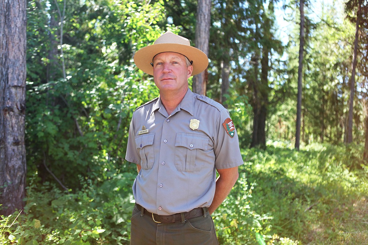 Glacier National Park wildlife biologist John Waller is pictured outside his office July 24. Waller has worked at the park for the past 16 years and specializes in grizzly bears. (Mackenzie Reiss/Daily Inter Lake)