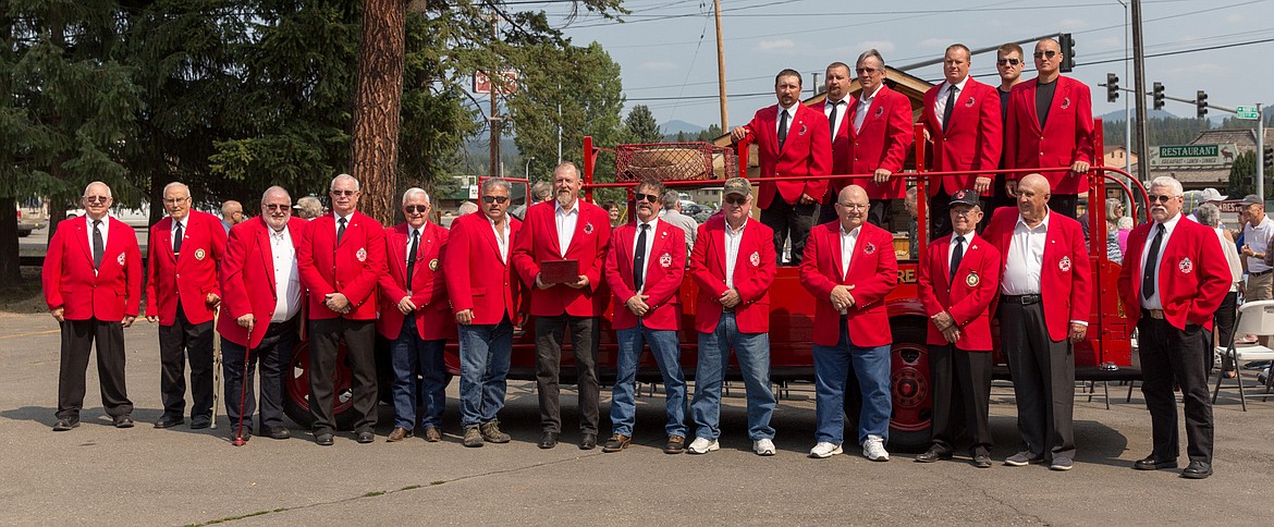 Libby Volunteer firefighters donned their dress reds Saturday to honor the late Hugh Swimley a volunteer firefighter from 1955 to 1980. (John Blodgett/The Western News)