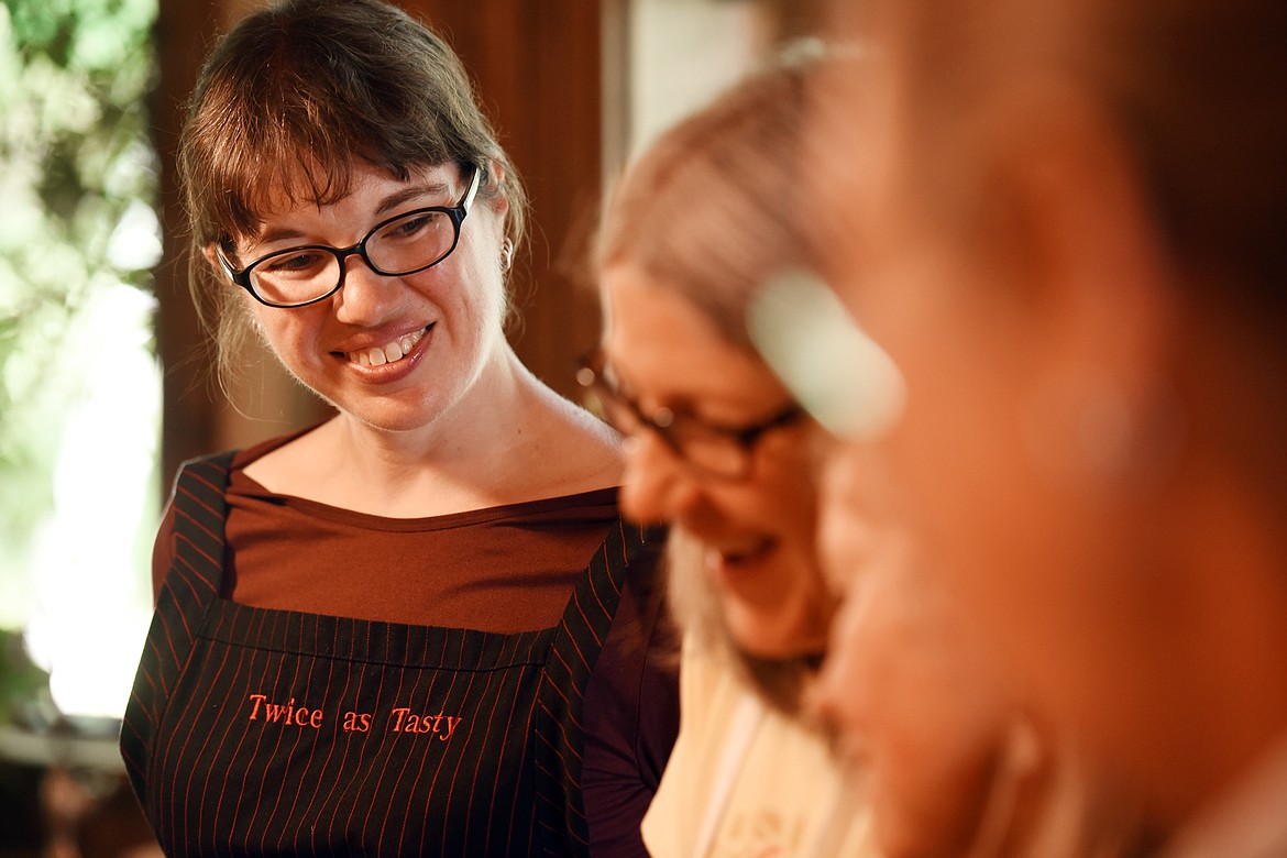 Julie Laing smiles as she teaches a workshop in Whitefish.