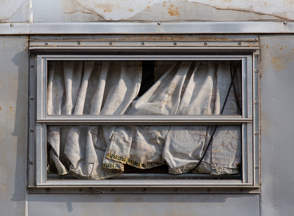 Curtains adorn a front window on a horse trailer parked at the Kootenai River Stampede PRCA Rodeo in Libby Saturday, Aug. 5, 2017. (John Blodgett/The Western News)