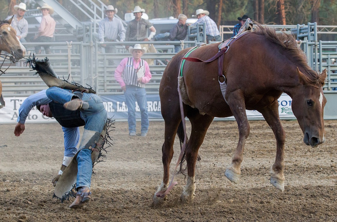 Chase Redfield of Opheim, Montana competes in bareback riding at the Kootenai River Stampede PRCA Rodeo in Libby Saturday, Aug. 5, 2017. (John Blodgett/The Western News)