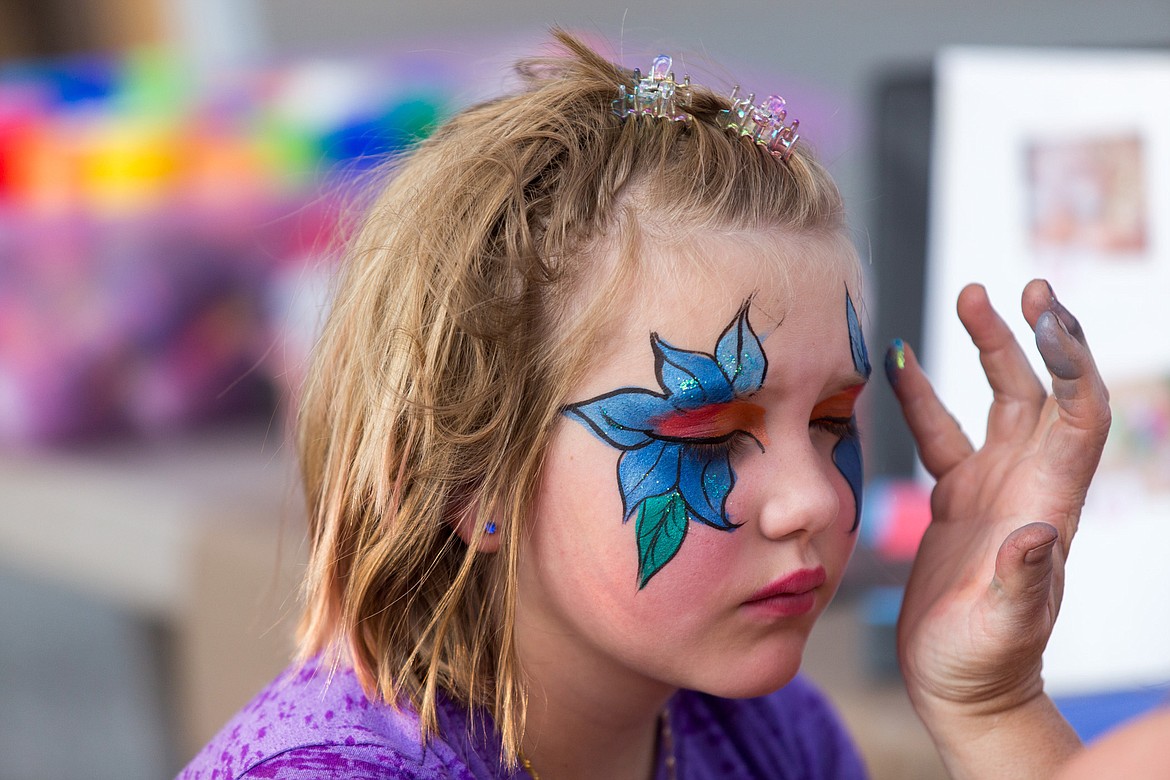 Nicole Nixon, 9, of Libby gets her face painted at the rodeo in Libby Saturday, Aug. 5, 2017. (John Blodgett/The Western News)