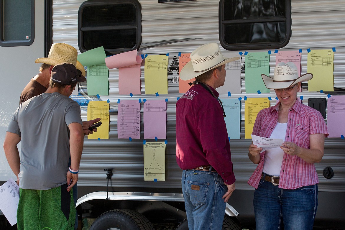 The side of a trailer served as a bulletin board for competitors at the Kootenai River Stampede PRCA Rodeo in Libby Saturday, Aug. 5, 2017. (John Blodgett/The Western News)