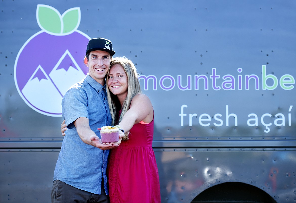 BEST FOOD TRUCK &#151; Jared and Lindley Lynch outside their Mountain Berry Bowls food truck in Whitefish with one of their signature dishes, a bowl that combines their&#160;acai berry blend topped with granola, bananas, kiwi, strawberries, blueberries and huckleberries and&#160;mango topped with coconut, bee pollen and honey. Mountain Berry Bowls won the Best Food Truck category of the 2017 Best of the Flathead reader poll.(Brenda Ahearn/Daily Inter Lake)