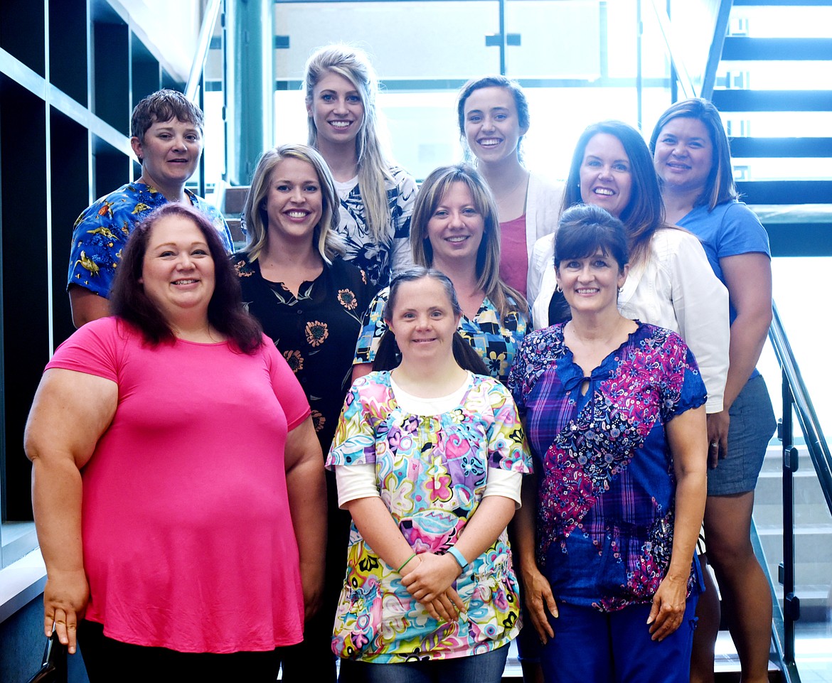 From left, row one: Kristie Holcomb, Brooke Taylor, Diana Washburn, row two: Hannah Hinzman, Michelle Albin, Tami Hyndman, row three: Jessie Vanschoyck, Lacey Drew, Rebecca Konen, and Theresa Campbell were the winners of the Best Office Staff category of the 2017 Best of the Flathead Poll.&#160;(Brenda Ahearn/Daily Inter Lake)