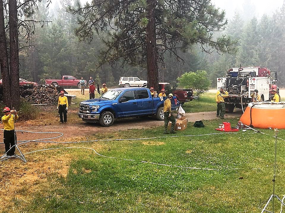 The Bay home located at Rivulet was put on Stage 1 Evacuation orders last week. Fire crews implemented structure protection as the Sunrise Fire moved in that direction. (Photo courtesy of Kavita Bay)