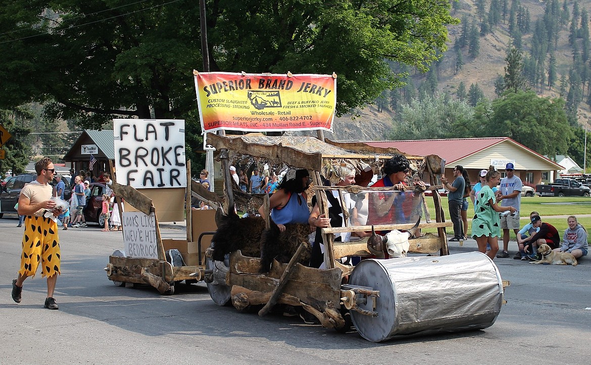 &#147;Flat Broke Fair&#148; was the theme for this year&#146;s fair parade. Superior Meats took the theme to the extreme with their Fintstones cartoon car float. (Kathleen Woodford/Mineral Independent)