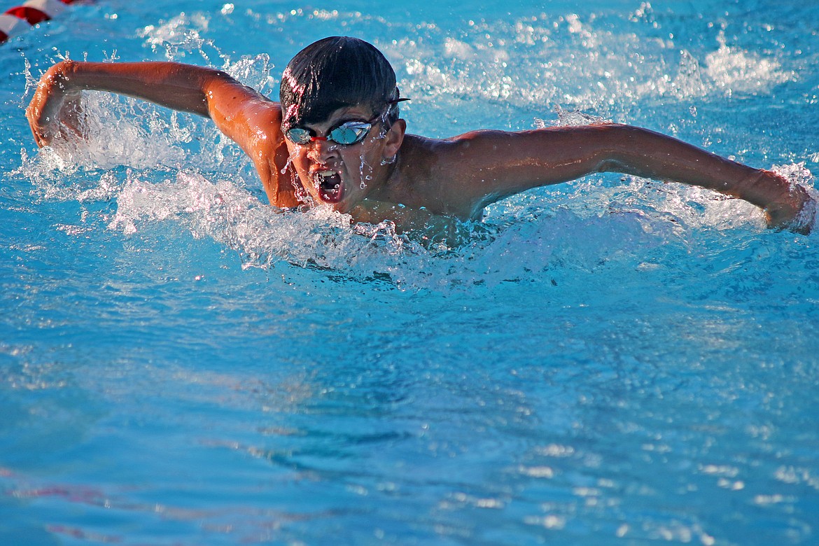 Bob Barrett photo - Alex Martinez splashes his way to a third place finish in the boys 13-14 butterfly.