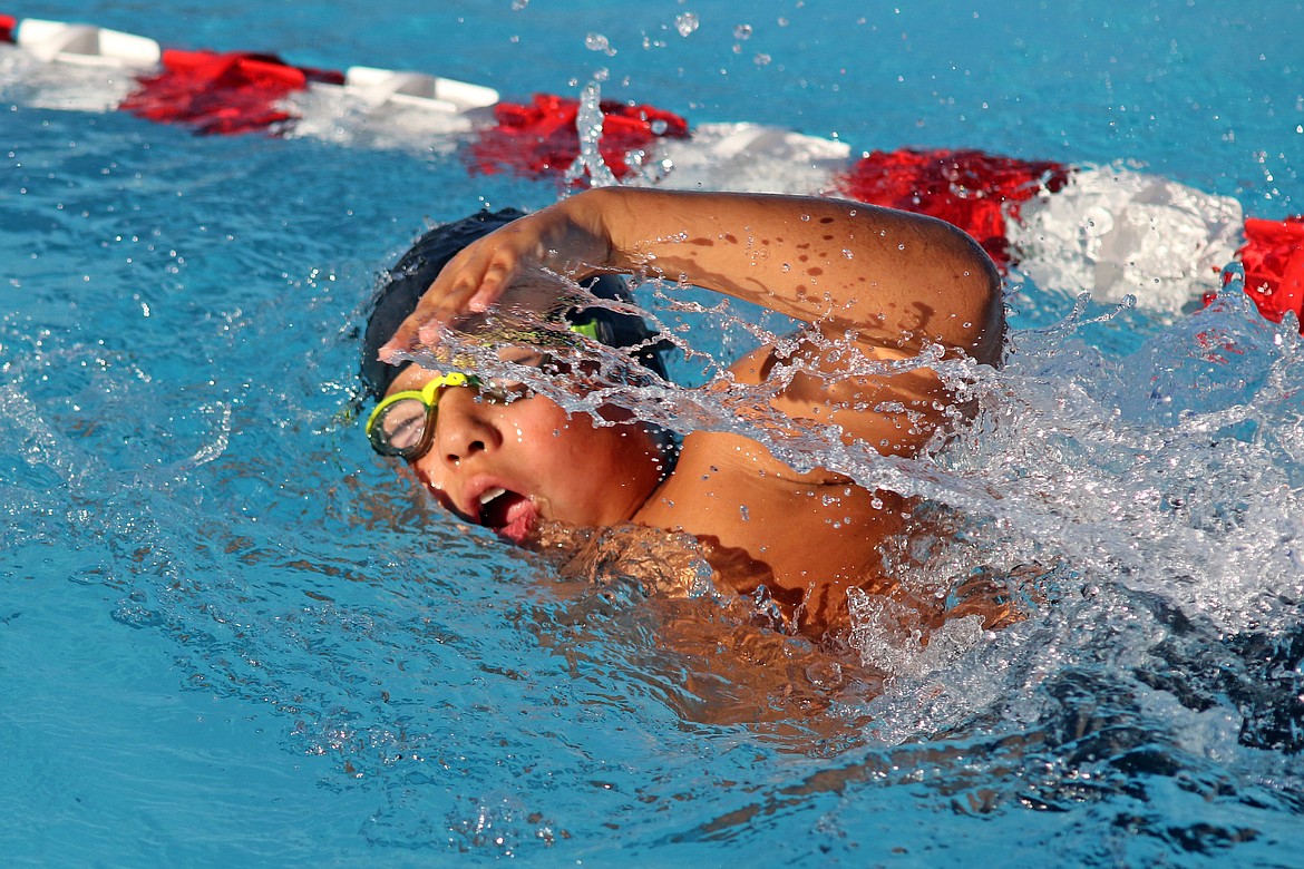 Bob Barrett photo - Martin Marroquin swims the freestyle during Tuesday's home meet against Toppenish.