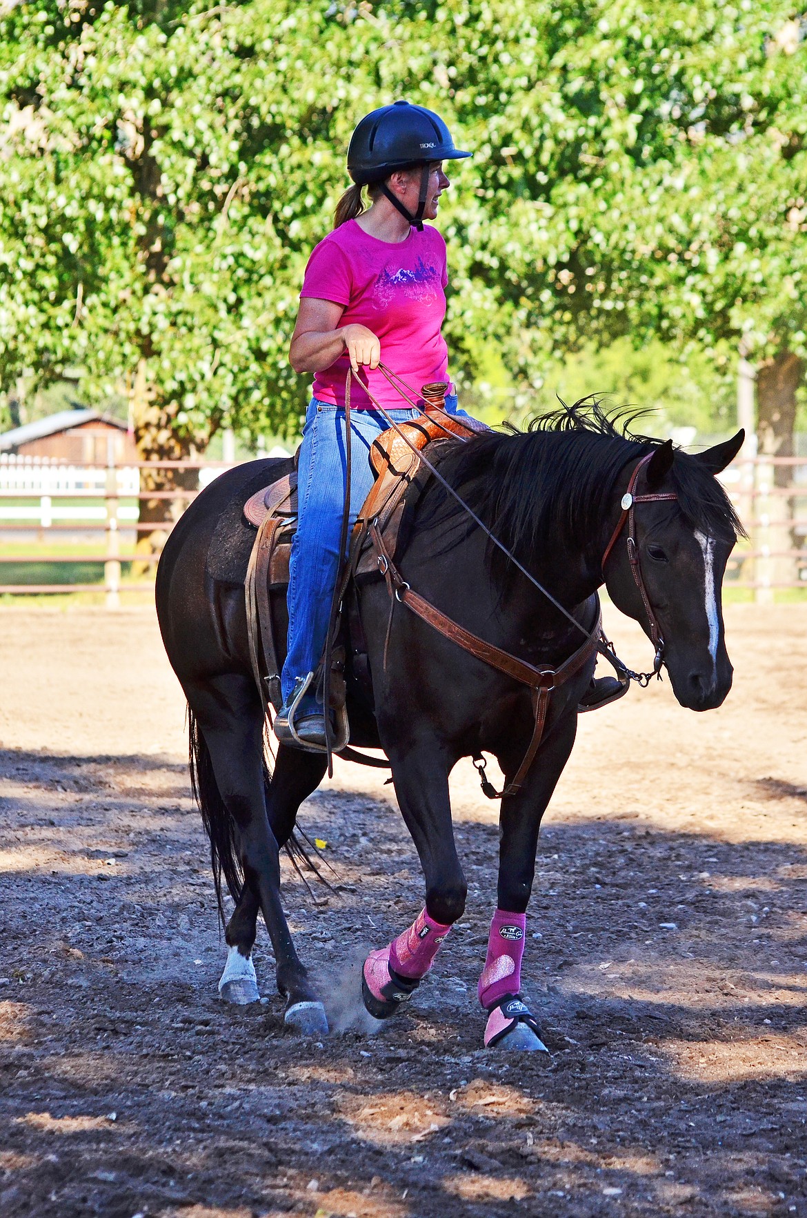 Michelle McGuigan helping 4H riders warm up effectively during the practice session. Photo Credit Erin Jusseaume Clark Fork Valley Press