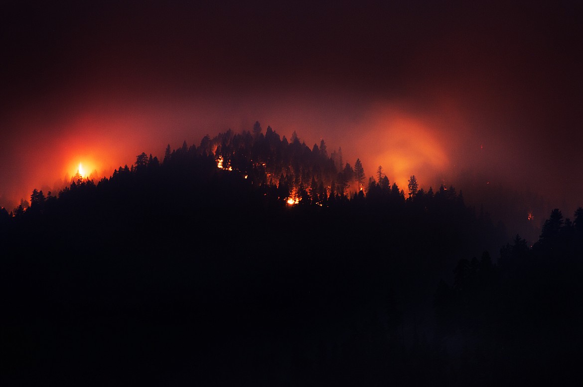 The Sunrise Fire burns in the Lolo National Forest near Superior Saturday evening. (Jeremy Weber/Mineral Independent)