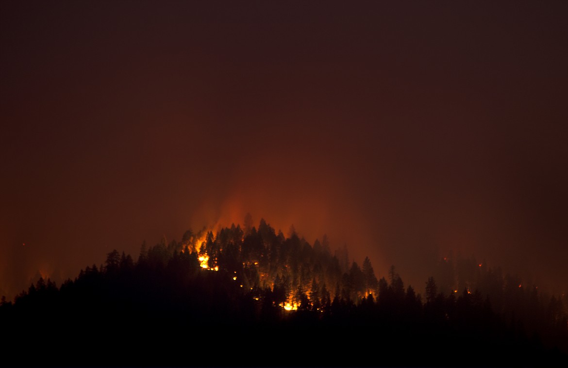 The Sunrise Fire burns in the Lolo National Forest near Superior Saturday evening. (Jeremy Weber/Mineral Independent)