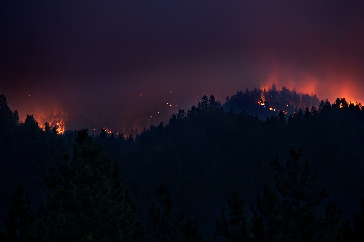 The Sunrise Fire burns in the Lolo National Forest near Superior Saturday evening. (Jeremy Weber/Mineral Independent)