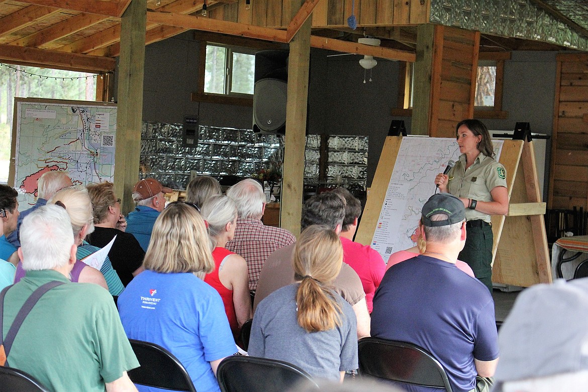 Ninemile Ranger, Erin Phelps, speaks to the public during a July 26 meeting at the Lozeau Lodge off Exit 55 of I-90. (Kathleen Woodford/Mineral Independent)