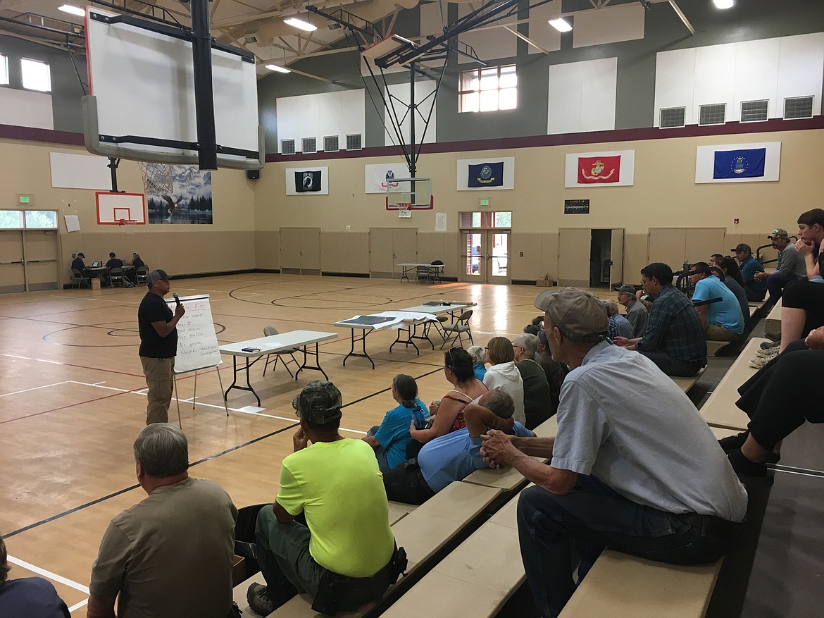 Concerned citizens filled the Arlee Community Center Monday evening to receive information on the status of the Liberty Fire from CT Camel, Fire Prevention Specialist with the Division of Fire. (Ashley Fox/Lake County Leader)