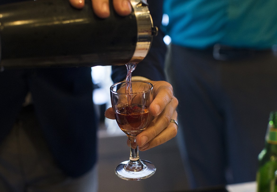 LOREN BENOIT/PressThe Apple Cranberry Mule. The drink is made with vodka, cranberry juice, sparkling apple juice, ginger beer and cranberries for garnish.