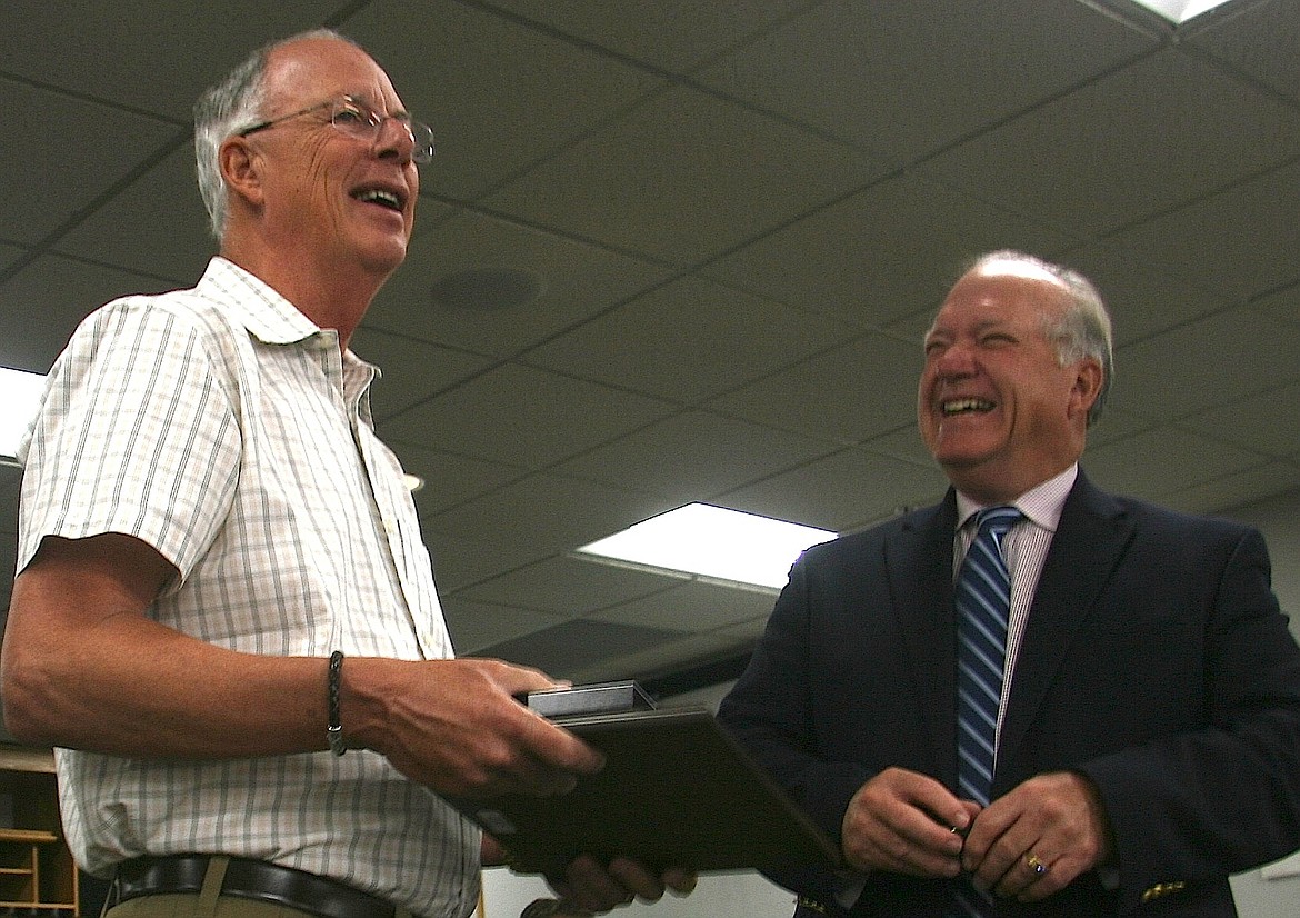 BRIAN WALKER/Press
Skip Priest, left, who served as a member of the Washington House of Representatives for four terms, was named the Adopt-a-Highway Volunteer of the Year for the Idaho Transportation Department&#146;s District 1 region on Thursday. Priest was presented the award from Jim Coleman, who is the Idaho Transportation Board&#146;s District 1 member.