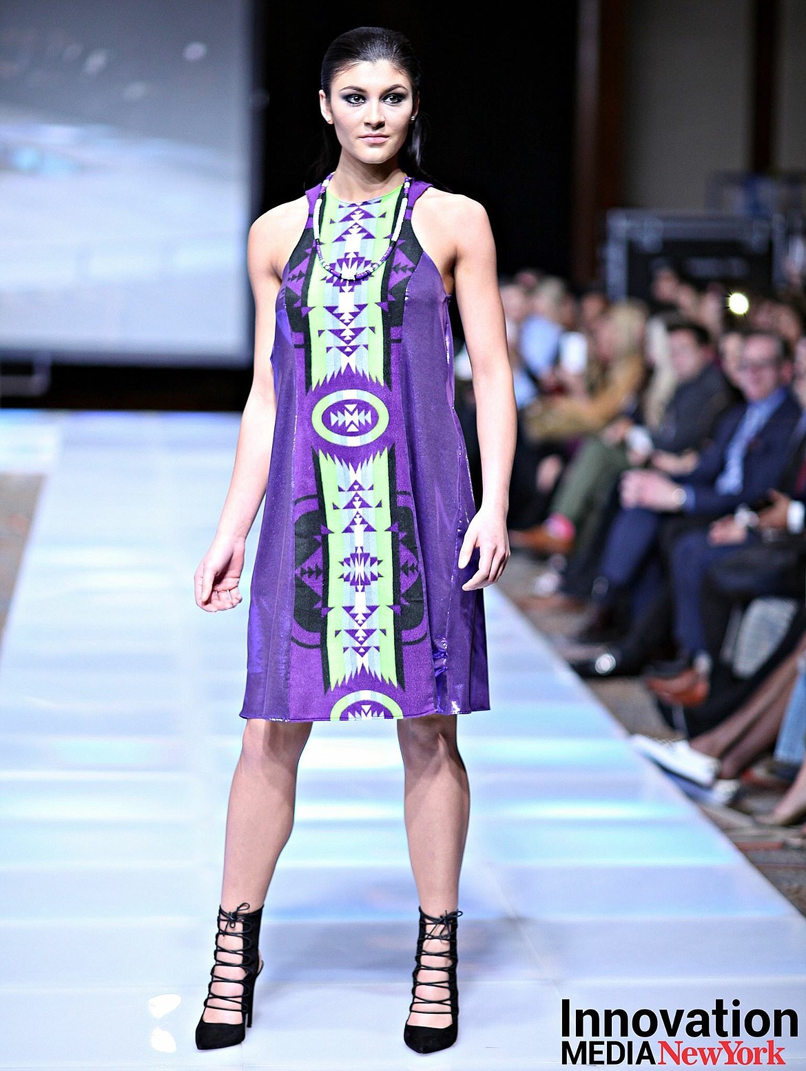 A model pauses at the end of the runway in a Belinda Bullshoe dress at New York Fashion Week. (Courtesy of Belinda Bullshoe and Innovation Media New York)