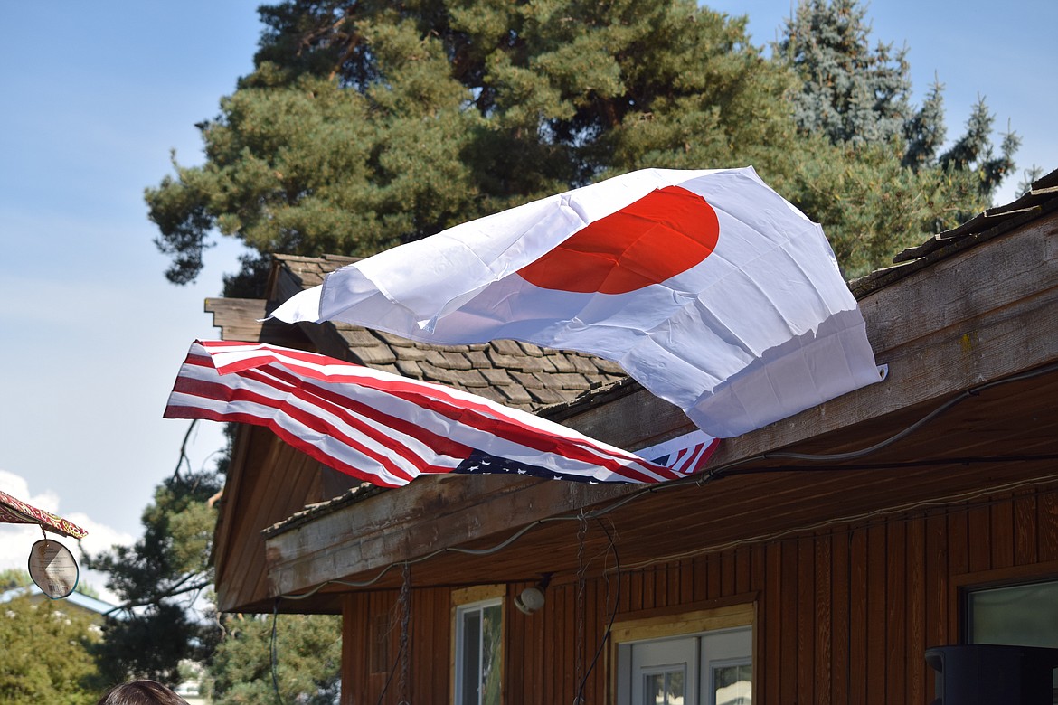 Charles H. Featherstone/Columbia Basin Herald
Japanese and American flags flutter in the Sunday afternoon breeze.