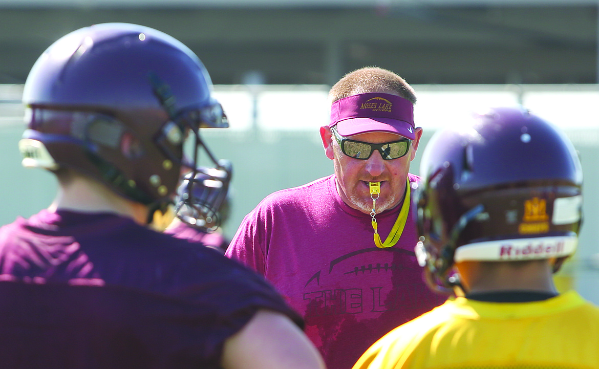 Connor Vanderweyst/Columbia Basin Herald
Moses Lake head coach Todd Griffith leads practice Wednesday at Moses Lake High School.