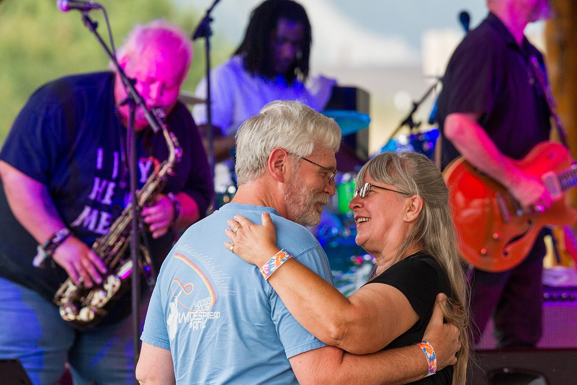 Below: A couple dances to the Mark May Band at the Riverfront Blues Festival in Libby on Saturday, Aug. 12, 2017. (John Blodgett/The Western News)