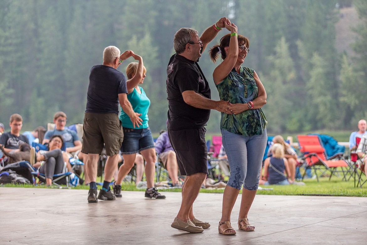 Couples dance at the Riverfront Blues Festival in Libby on Friday, Aug. 11, 2017. (John Blodgett/The Western News)